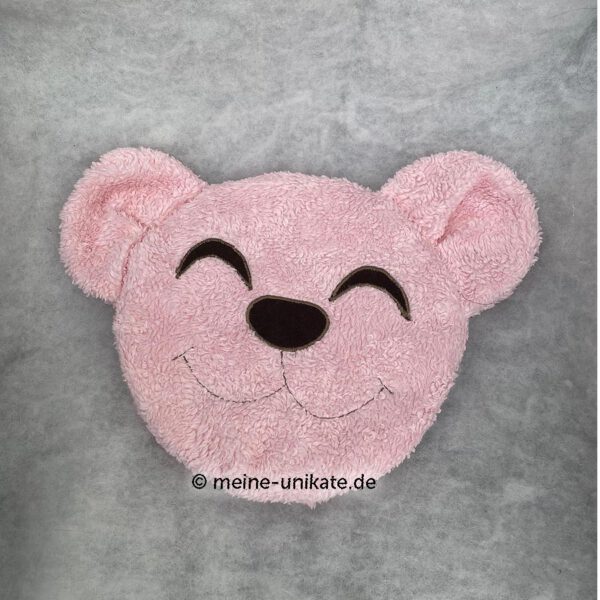 Babykissen, Flachkissen, Geschenk zur Geburt oder Taufe. Teddykopf genäht aus Webpelz in Rosa und Applikation von Augen und Nase. Stoff-Unikat handmade in Germany