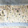 Detailansicht von der Kinderdecke Elfenträume in hellblau mit kleinen Elfen. Stoff-Unikat handmade in Germany