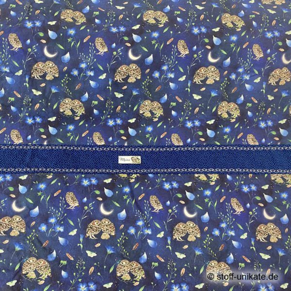 Detailansicht vom Babytuch mit Nachteulen. Label mit Eule. Stoff-Unikat handmade in Germany
