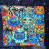 Detailansicht von Mandala-Katzen vom Katzenquilt Colourful Cats. Stoff-Unkkat handmade in Germany