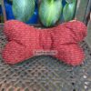 Stoffknochen, Leseknochen mit Schrift auf Rot. Stoff-Unikat handmade in Germany