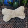 Rückseite vom großen Leseknochen aus braunem Teddyplüsch mit Eselmotiven. Stoff-Unikat handmade in Germany