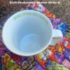 Porzellanbecher von Laurel Burch als Geschenkset mit Stoffdeckchen. Stoff-Unikate handmade in Germany