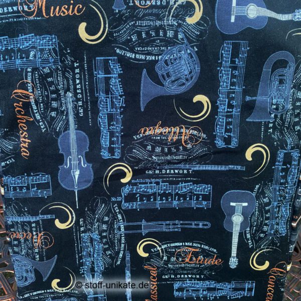 Detailansicht vom Baumwollstoff der XXL-Einkaufstasche mit Musikinstrumenten. Stoff-Unikate handmade in Germany