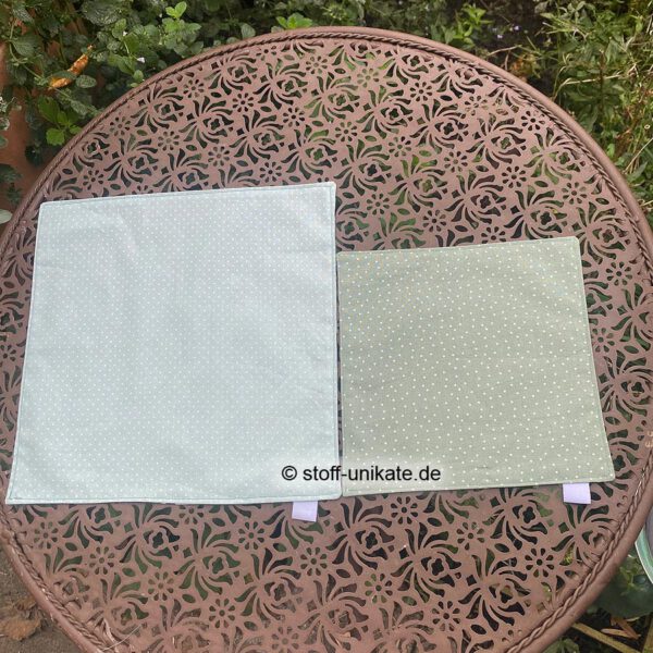 Rückseiten der Stoffdeckchen mit Kürbis- und Katzenmotiven. Stoff-Unikate handmade in Germany