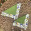 Zwei Stoffdeckchen mit Olivenmotiven zur Auswahl. Stoff-Unikate handmade in Germany