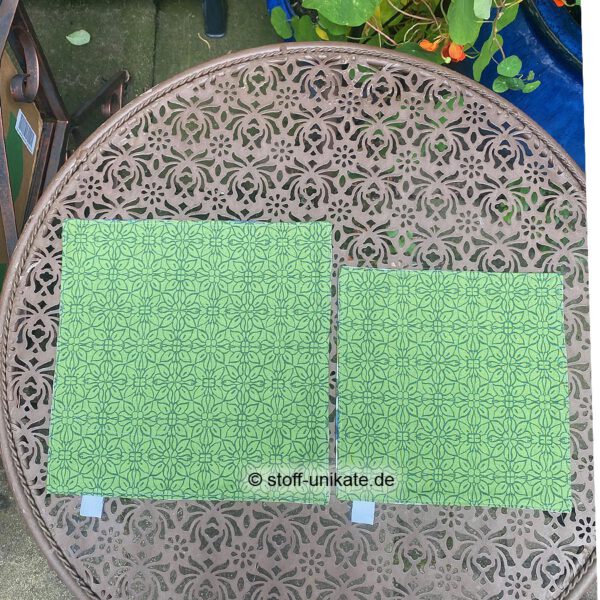 Rückseiten der Stoffdeckchen mit Olivenmotiven. Stoff-Unikate handmade in Germany