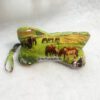 Kleiner Leseknochen mit Pferdemoitven auf der Wiese. Stoff-Unikate handmade in germany