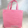 Büchertasche genäht aus reinen Baumwollstoffen in Pink. Stoff-Unikate handmade in germany