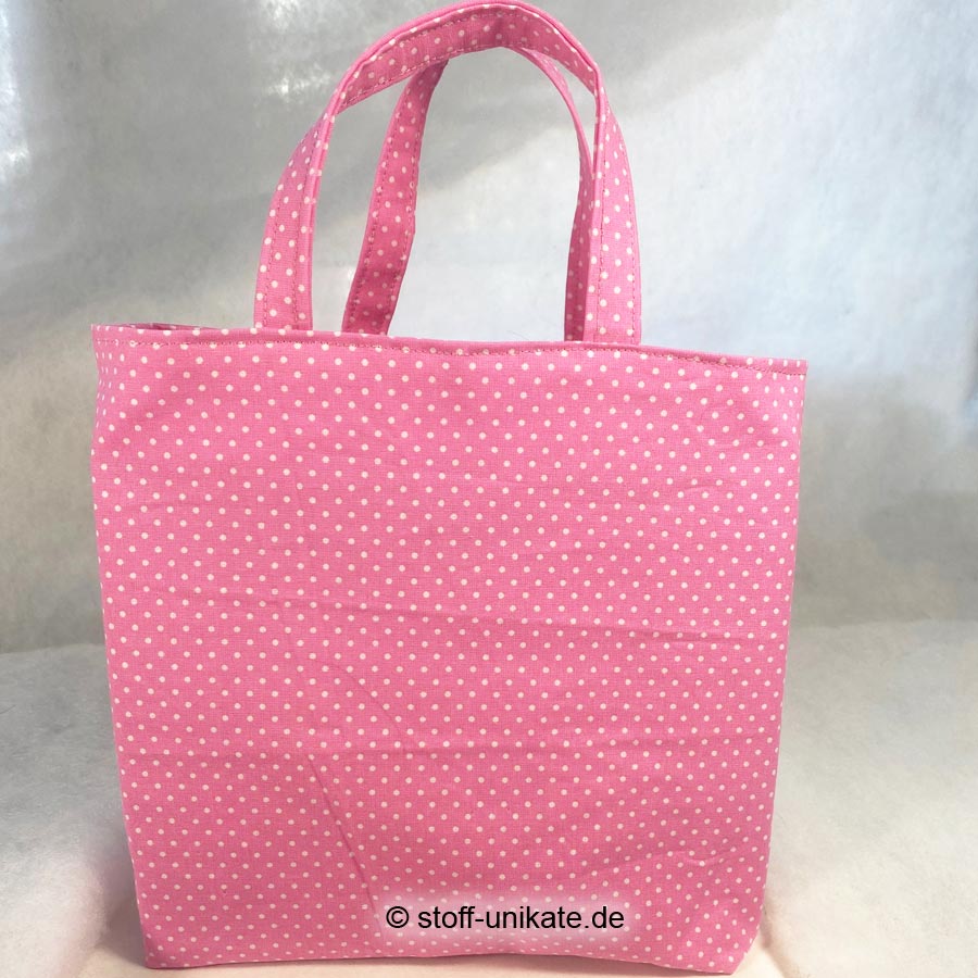 Büchertasche genäht aus reinen Baumwollstoffen in Pink. Stoff-Unikate handmade in germany