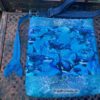 Reißverschlussabschluss in Flossenform zur Orka-Tasche. Stoff-unikate handmade in Germany