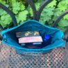 Innenansicht der Tablet-Tasche Wal hope, passend für zwei Taschenbücher und eine Wasserflasche. Stoff-Unikate handmade in germany